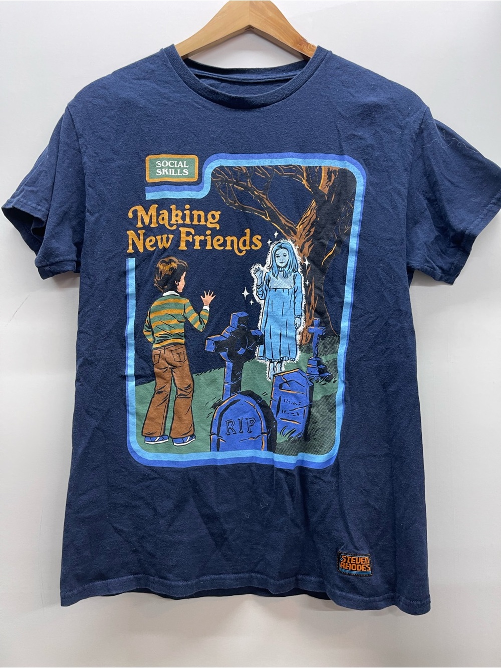 Steven Rhodes "Making New Friends" graphic t-shirt in navy blue